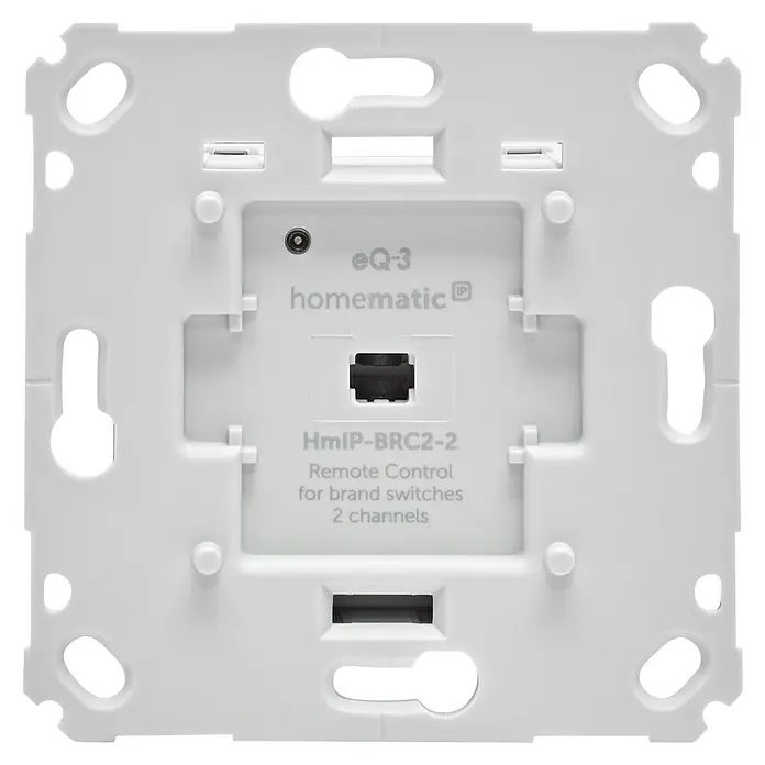 Homematic IP Funk-Wandtaster HmIP-BRC2-2 - 2-fach, Unterputzmontage, 230 V, 37 x 71 x 71 mm - Weiße Homematic IP HmIP-BRC2-2 2-Kanal-Fernbedienung für Markenschalter, Rückansicht mit modularem Stecker und Befestigungslöchern.