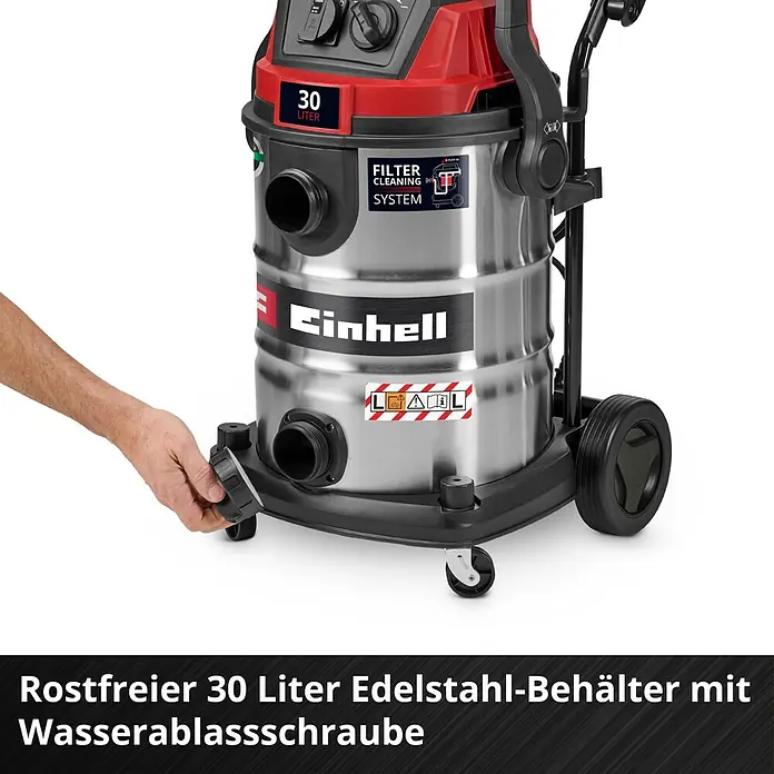 Einhell Elektro-Nass- & Trockensauger TE-VC 3080 SACL - 1.150 W, Behältervolumen: 30 l, Halbautomatisch - Einhell 30 Liter Nass-Trockensauger mit Edelstahlbehälter. Eine Hand ist an der Wasserablassschraube zu sehen.
