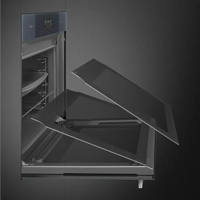 Smeg Horno empotrado SOP6102S2PG - Número de tipos de calentamiento: 12 ud., Volumen horno: 68 l - Horno gris oscuro con paneles de vidrio internos de la puerta retirados y apoyados entre sí para fácil limpieza.