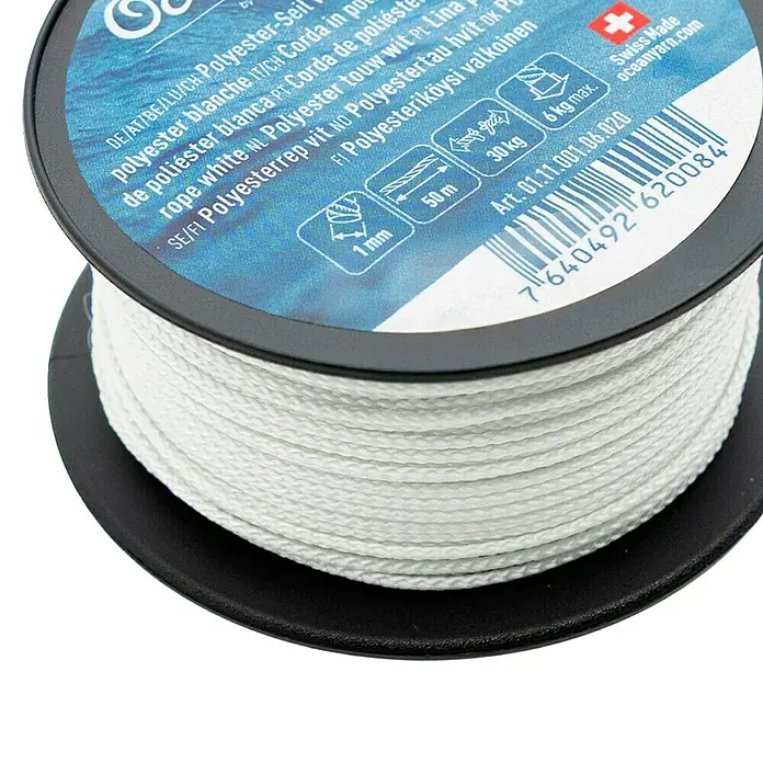 OceanYarn Polyester-Seil OCEANYARN - Länge: 50 m, Durchmesser: 1 mm, Belastbarkeit: 30 kg, Weiß - Weißes Polyesterseil auf einer schwarzen Spule.