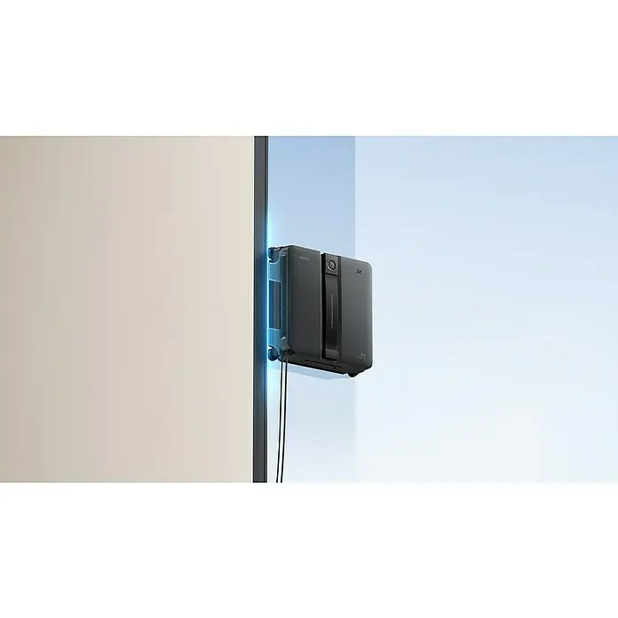 Mova Robot limpiacristales N1 - Capacidad del depósito de agua del robot: 120 ml, Potencia de aspiración: 8.000 Pa - Robot limpiacristales gris oscuro con luz azul limpiando una ventana.