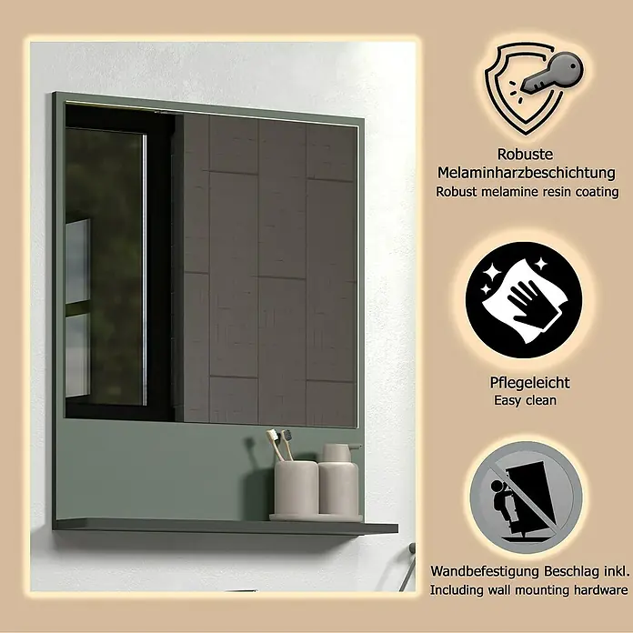 Trendteam Niklas Ablagespiegel - 60 x 14 x 74 cm, Grün - Grüner Spiegelschrank mit dunkler Spiegeltür und integriertem Regal, auf dem Zahnbürsten und ein Seifenspender stehen.