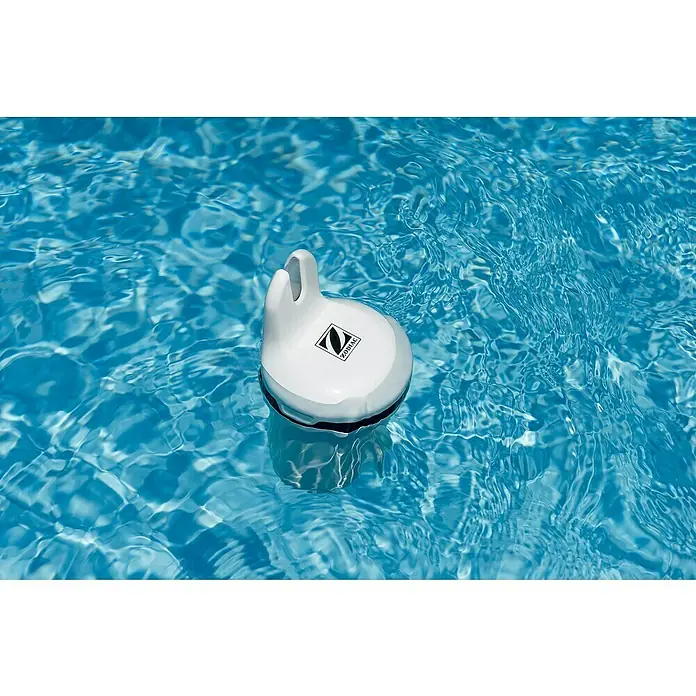 Medidor de cloro y ph Blue Connect Silver - Específico para: Piscinas tratadas con cloro o bromo - Dispensador de cloro blanco Zodiac flotando en agua azul ondulada de la piscina.