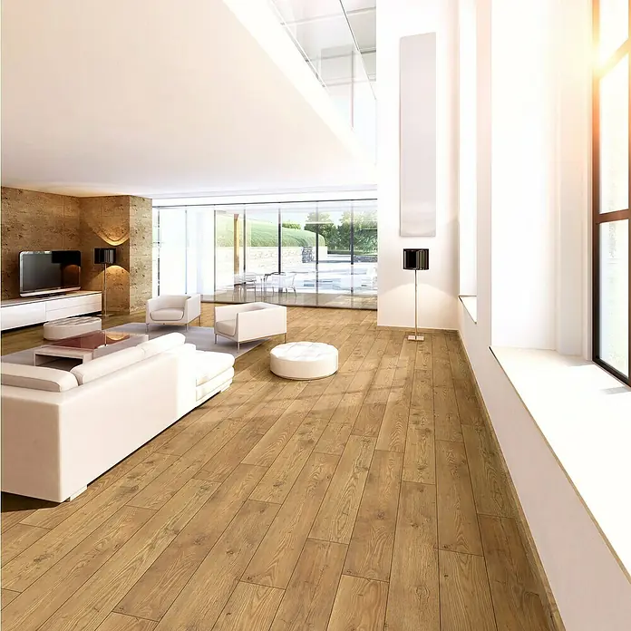 Laminado Hidro Tawny Chest - 1.288 x 195 x 10 mm, Marrón, AC5, Resistente a la presión - Suelo de madera marrón claro con veta natural en un salón moderno y espacioso.