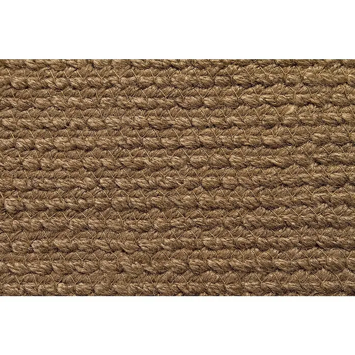 Alfombra exterior In/Out Ebro - Marrón, 110 x 60 cm, 100% Polietileno - Primer plano de una textura de fibra marrón gruesa y estrechamente tejida.