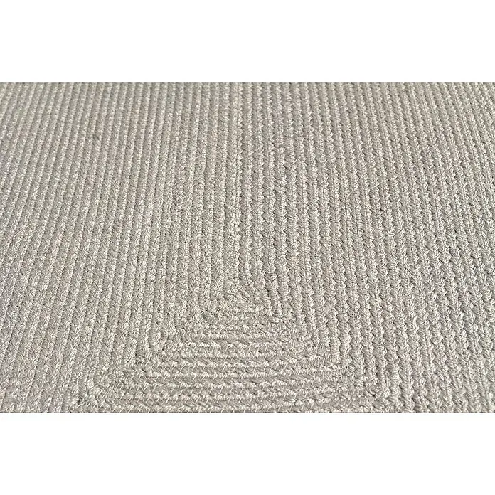 Alfombra exterior In/Out Ebro - Plata, 110 x 60 cm, 100% Polietileno - Alfombra trenzada gris claro con un detalle de textura enrollada.