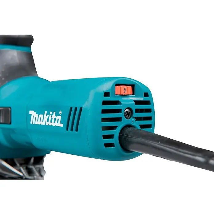 Makita Elektro-Pendelhubstichsäge 4351FCTJ - 800 /min - 2.800 /min, Max. Schnitttiefe in Holz: 135 mm, Anzahl Pendelhubstufen: 4 Stk. - Nahaufnahme des türkisfarbenen Gehäuses eines Makita Elektrowerkzeugs mit orangefarbenem Drehregler auf '5' und schwarzem Netzkabel.