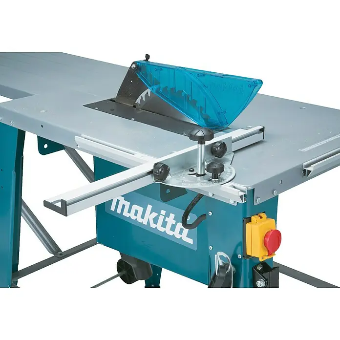 Makita Tischkreissäge 2712 - 2.000 W, Durchmesser Sägeblatt: 315 mm, Schnitttiefe bei 90 °: 85 mm - Eine tealfarbene Makita Tischkreissäge mit grauem Tisch, blauem Sägeblattschutz und schwarz/gelben Bedienelementen. Mit verstellbaren Führungen und Sicherheitsschalter.