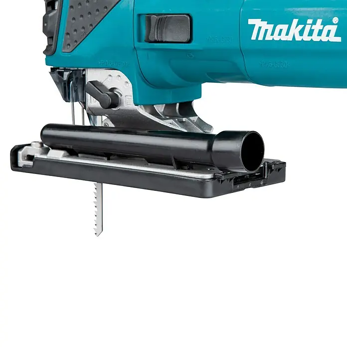 Makita Caladora eléctrica 4351FCTJ - 800 /min - 2.800 /min, Profundidad de corte máx. en madera: 135 mm, Número de niveles de elevación del péndulo: 4 ud. - Primer plano de una sierra de calar Makita turquesa y negra con hoja, placa base y puerto de extracción de polvo visibles.