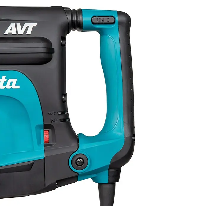 Makita Abbruchhammer HM1213C - 1.510 W, 18,6 J, SDS-Max-Aufnahme - Schwarz-türkises Elektrowerkzeug mit AVT und teilweisem Makita-Branding, mit Ein/Aus-Schalter und Geschwindigkeitsregler.
