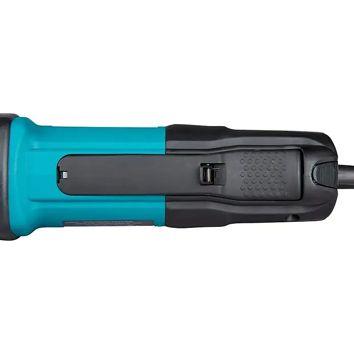 Makita Geradschleifer GD0600 - 400 W, 25.000 U/min - Nahaufnahme des türkisen und schwarzen Hauptgehäuses eines Elektrowerkzeugs mit Batteriefreigabemechanismus.