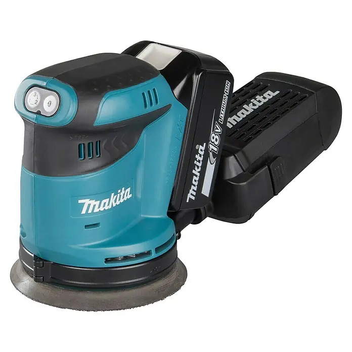 Makita LXT 18V Lijadora excéntrica de batería DBO180RTJ -  - Una lijadora orbital inalámbrica Makita 18V, azul verdoso y negra, con batería.