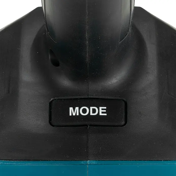Makita LXT 18V Akku-Stableuchte DML818 - 18 V, Ohne Akku - Nahaufnahme eines schwarz-türkisen Elektronikgeräts mit schwarzem 'MODE'-Knopf mit weißem Text.