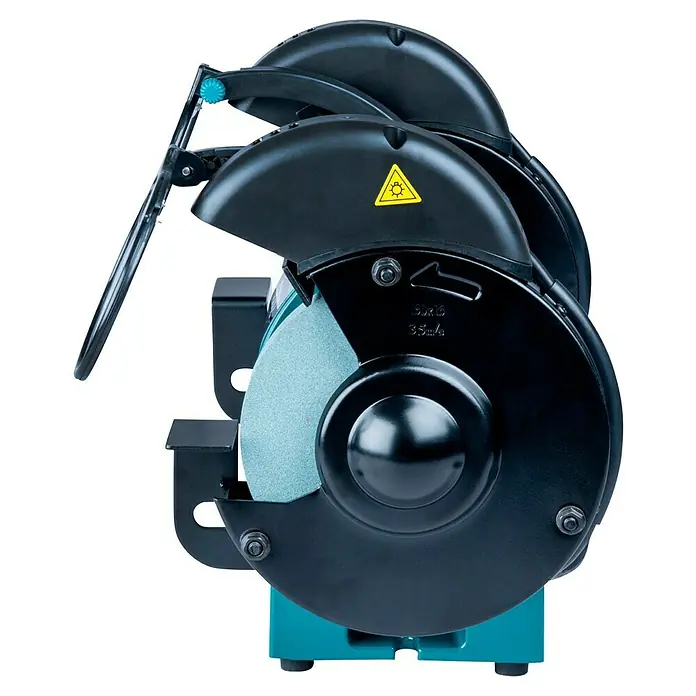 Makita Elektro-Doppelschleifer GB602 - 250 W, 2.850 U/min - Schwarz-türkiser Doppelschleifbock mit zwei hellblauen Schleifscheiben und transparenten Schutzschildern.