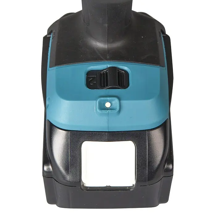 Makita LXT 18V Pistola de aire caliente de batería DHG181ZK - 18 V, Sin batería, Rango de temperaturas: 150 °C - 550 °C - Vista superior de un componente de herramienta eléctrica negro y turquesa con un interruptor negro y una luz indicadora blanca.
