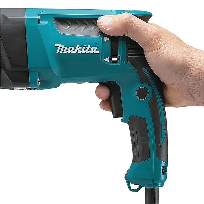Makita Kombihammer HR2631FT13 - 800 W, 2,4 J, Schnellspannbohrfutter - Makita Elektrowerkzeug in Türkis und Schwarz, von einer Hand gehalten, mit Griff und Bedienelementen.
