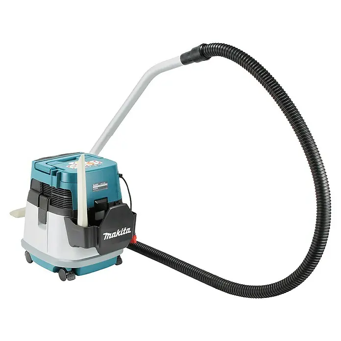 Makita LXT 18V Akku-Nass-Trockensauger DVC150LZ - 36 V, Ohne Akku, Behältervolumen: 15 l - Makita blaugrüner und weißer Industriestaubsauger mit langem schwarzem Wellschlauch und hellgrauem Saugrohr auf Rollen.