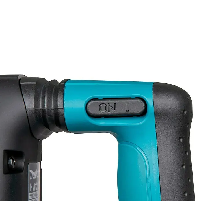 Makita Abbruchhammer HM1213C - 1.510 W, 18,6 J, SDS-Max-Aufnahme - Türkisfarbener und schwarzer Werkzeuggriff mit strukturierter Oberfläche und einem „ON I“-Schalter.