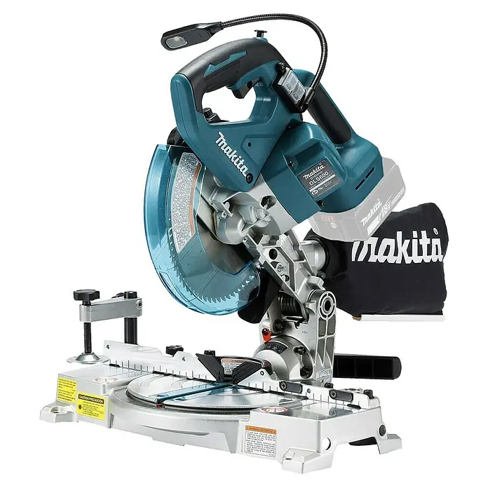 Makita LXT 18V Akku-Kapp- & Gehrungssäge DLS600Z - 18 V, Ohne Akku, Leerlaufdrehzahl: 5.000 U/min - Makita Akku-Kappsäge mit türkisen/schwarzen Akzenten, silbernem Sockel, klarem Blattschutz und Staubsack. Integriertes LED-Licht sichtbar.