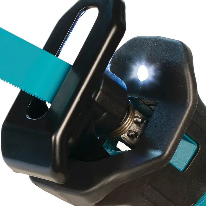 Makita Akku-Säbelsäge JR103DZ - 10,8 V, Ohne Akku, Leerlaufhubzahl: 0 /min - 3.300 /min - Nahaufnahme einer dunkelgrauen Säbelsäge mit türkisfarbenem Blatt und integrierter LED-Leuchte am Sägebereich.