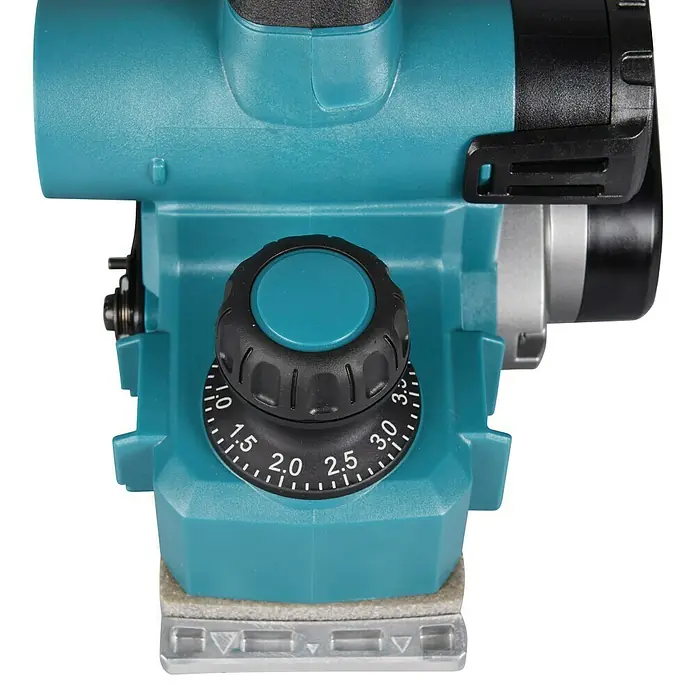 Makita XGT 40V max. Akku-Hobel KP001GZ - 40 V, Ohne Akku, Falztiefe: 0 mm - 25 mm, Leerlaufdrehzahl: 15.000 U/min - Nahaufnahme eines türkisen Elektrohobels mit Tiefeneinstellrad (0-3,5) und Motorgehäuse.