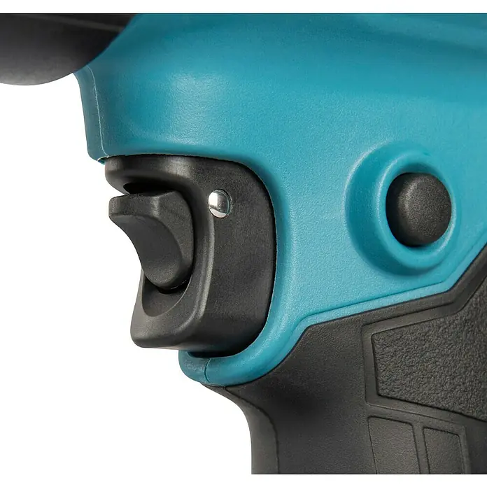 Makita XGT 40V max. Akku-Heißluftgebläse HG001G - 40 V, Ohne Akku, Temperaturbereich: 0 °C - 600 °C - Nahaufnahme des türkisen Kunststoffgriffs eines Elektrowerkzeugs mit schwarzem Abzug und rundem schwarzem Sicherungsknopf.