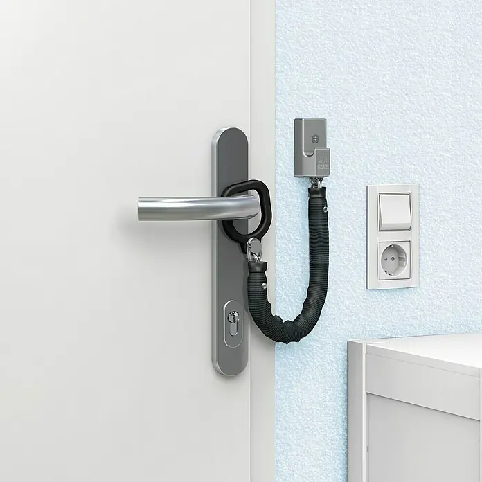 Basi Türkette TK 25 - Kettenlänge: 18,5 cm, Silber - Schwarzes, flexibles Türsicherungskabel an Türklinke und Wandanker für mehr Sicherheit.