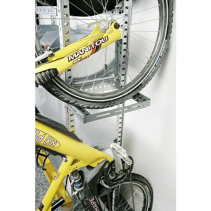 Scholz System Fahrradhalter - Breite: 300 mm - Gelbes Mountainbike sicher an einer Metallwandhalterung befestigt, ideal für platzsparende Aufbewahrung und Präsentation.