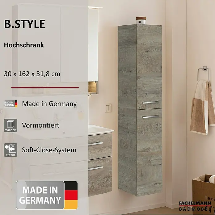 Fackelmann B.style Bad-Hochschrank - B x T x H: 30 x 31,8 x 162 cm, Nature Oak Holzoptik, DIN Anschlag: Links - Ein grauer Hochschrank in Holzoptik für Badezimmer mit zwei Türen und Metallgriffen, an der Wand neben einem Waschbeckenbereich montiert.