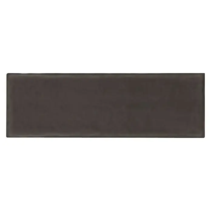 Modern Style Wandfliese Rustic Emotion - 9,8 x 29,8 cm, Schwarz, Glänzend - Nahaufnahme einer einzelnen, rechteckigen, schwarzen Subway-Fliese mit glänzender Oberfläche, ideal für moderne Küchendesigns.
