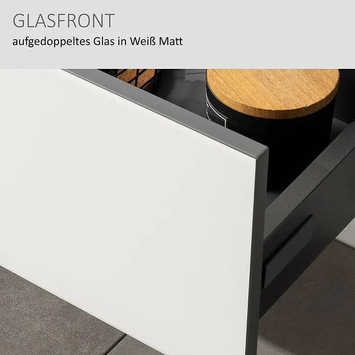 Camargue Marea Waschtischunterschrank - 117 x 38,5 x 48 cm, Anthrazit/Weiß - Mattweiße aufgedoppelte Glas-Schubladenfront, leicht geöffnet, zeigt den dunkelgrauen Schubladeninnenraum.