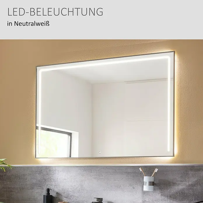 Camargue Marea LED-Lichtspiegel - 120 x 80 cm - Rechteckiger LED-Spiegel mit silbernem Rahmen, in Neutralweiß beleuchtet, über einem modernen Badezimmerwaschtisch installiert.