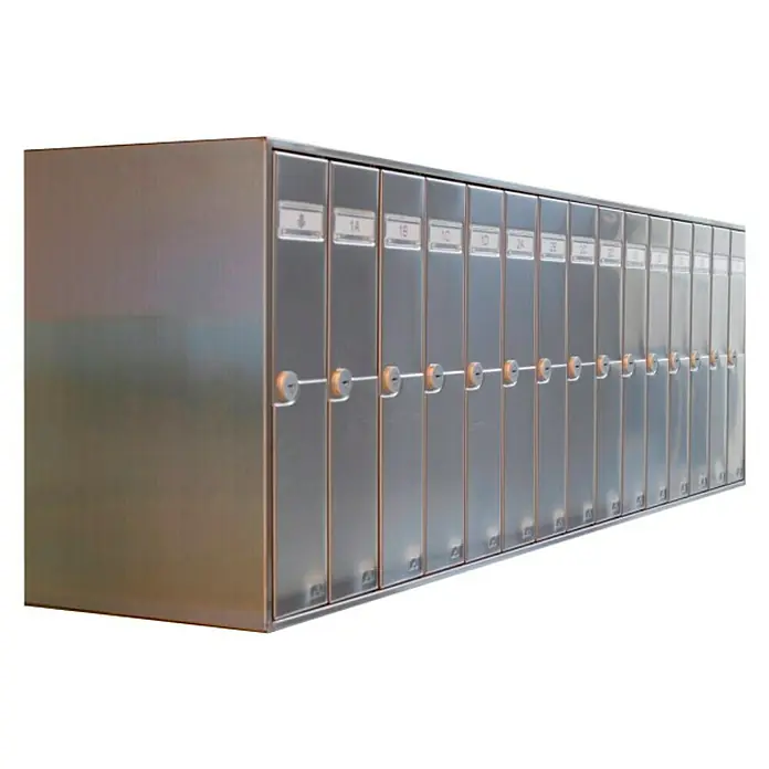 Arregui Libro Buzón de pared V115 - L x An x Al: 43,5 x 30 x 40 cm, Plata perla, Acero - Imagen de un bloque de buzones de acero inoxidable con compartimentos numerados y cerradura rotatoria para la recepción segura de correo.