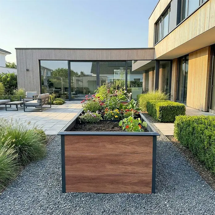 Metzler Hochbeet - 206 x 106 x 77 cm, Stahl, Anthrazit/Braun - Großes, rechteckiges Hochbeet mit Holzoptik-Paneelen und dunklem Rahmen, bepflanzt mit bunten Blumen im modernen Garten.