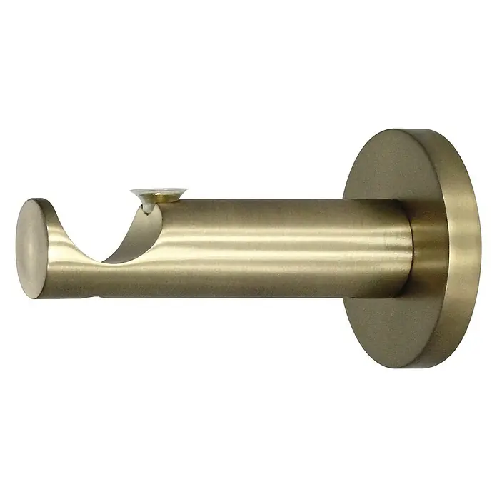 Expo Ambiente Träger Function - Messingoptik matt, Geeignet für: Gardinenstangen Ø 25 mm, 8 cm - Nahaufnahme einer goldenen Gardinenstangenhalterung, die ein schlichtes und modernes Design für die Fensterdekoration zeigt.