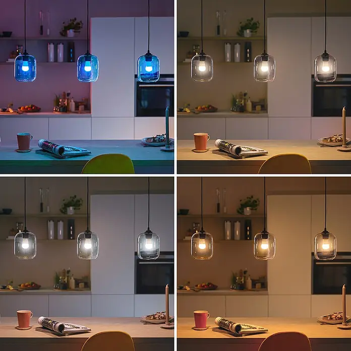 Philips Wiz Smart-LED-Lampe matter - E27, Dimmbar, RGBW, 470 lm, 4,9 W, 1 Stk. - Vier Ansichten einer Küche mit zwei smarten Glühbirnen in klaren Glaspendelleuchten, die verschiedene Lichtfarben und -temperaturen zeigen.