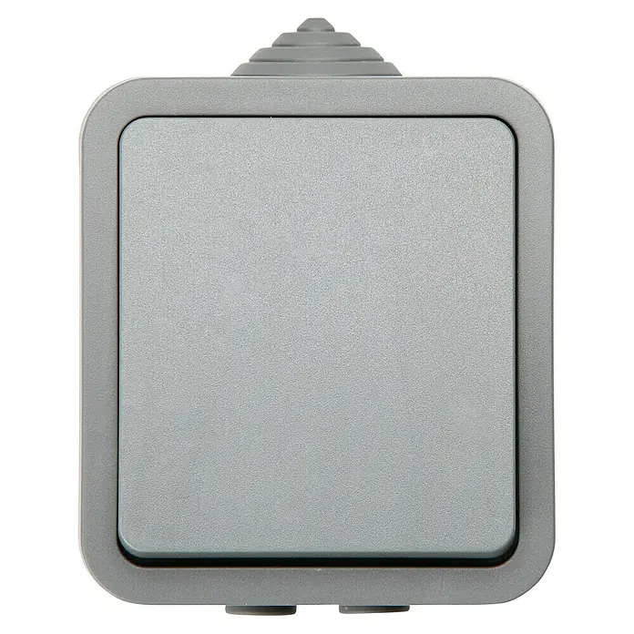 Voltomat Blueline Cruzamiento - Gris, Montaje en superficie, IP54 - Primer plano de un interruptor cuadrado gris con esquinas redondeadas, mostrando un diseño moderno y funcionalidad.