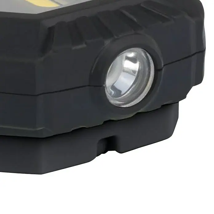 BAUHAUS Taschenlampe Rw. 160 - 12 x 4,5 x 1,7 cm, 110 lm - Nahaufnahme einer schwarzen Arbeitsleuchte mit einer runden LED-Lampe. Die Lampe hat ein robustes Design.
