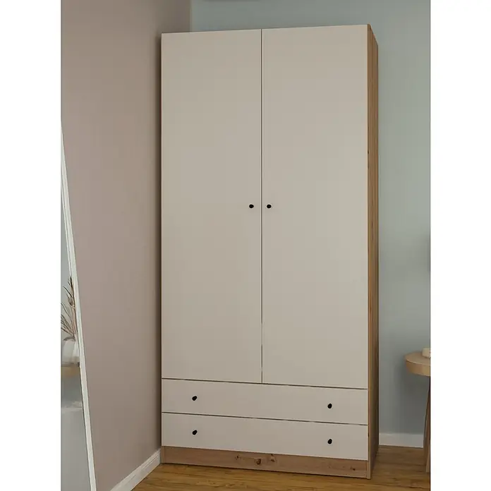 Meka Block Armario para ropa K-649 - L x An x Al: 51,6 x 100 x 205 cm, Cashmere/Roble Albar - Armario bicolor beige claro y madera con dos puertas y dos cajones con tiradores negros, en una habitación.