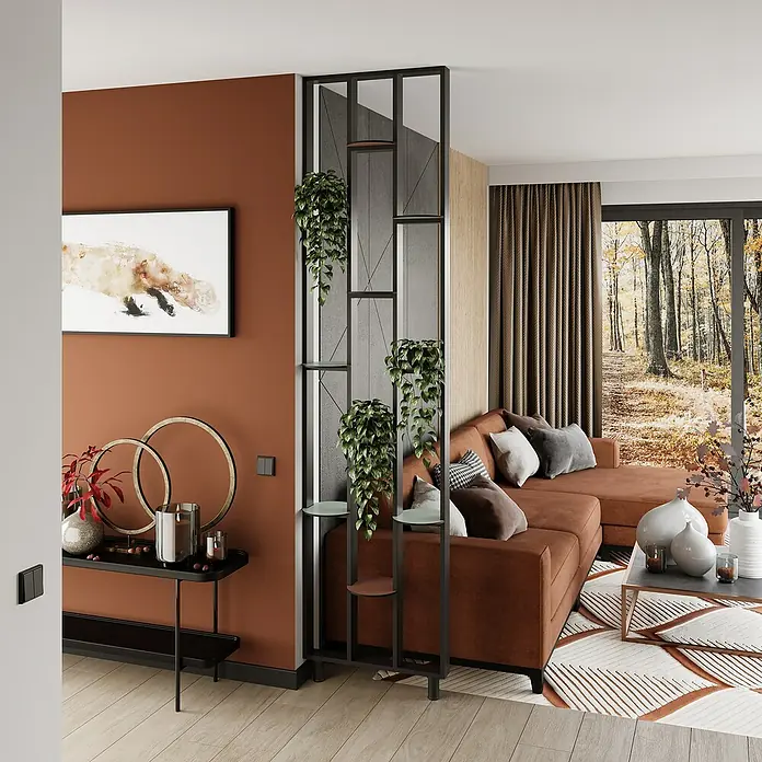 Mixpol Profile Raumteiler Cube Schwarz ARF - 63,4 x 250 cm, Schwarz - Schwarzer Metall-Raumteiler mit Regalen und Pflanzen, der einen orangefarbenen Sofabereich trennt.