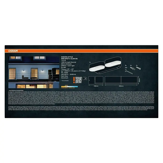 Osram Endura Style LED-Außenwandleuchte Mini - 13 W, 100 x 230 x 54 mm, Grau, IP44 - Dunkelgraue Aluminium-OSRAM Endura Style Mini Spot II LED-Außenwandleuchte, beleuchtet eine Hausfassade.