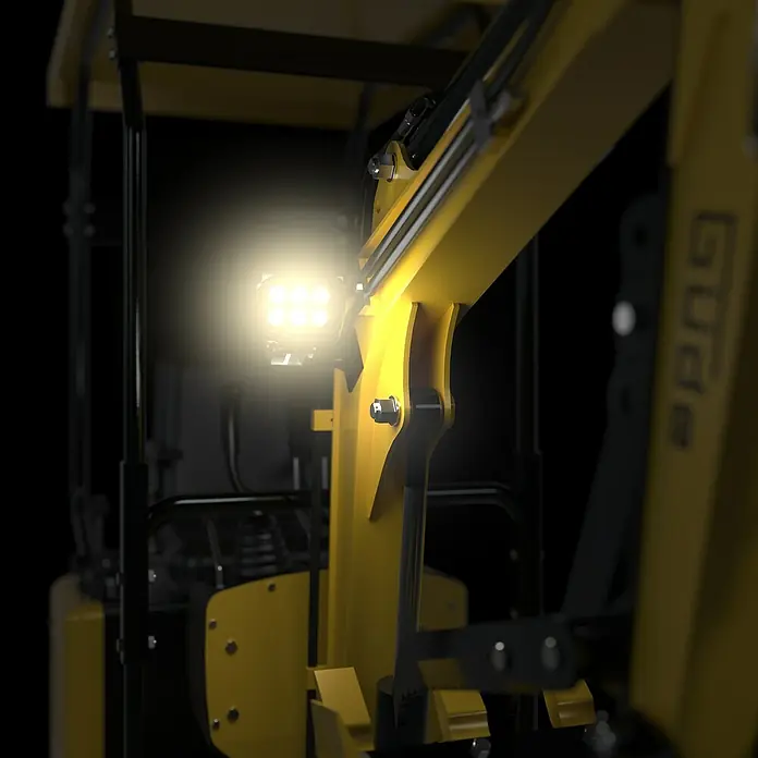 Güde Minibagger GMB 860B - Gelb, Benzin, L x B x H: 2.820 x 820 x 2.125 mm - Helles LED-Arbeitslicht an einem gelben Maschinenarm für starke Beleuchtung.