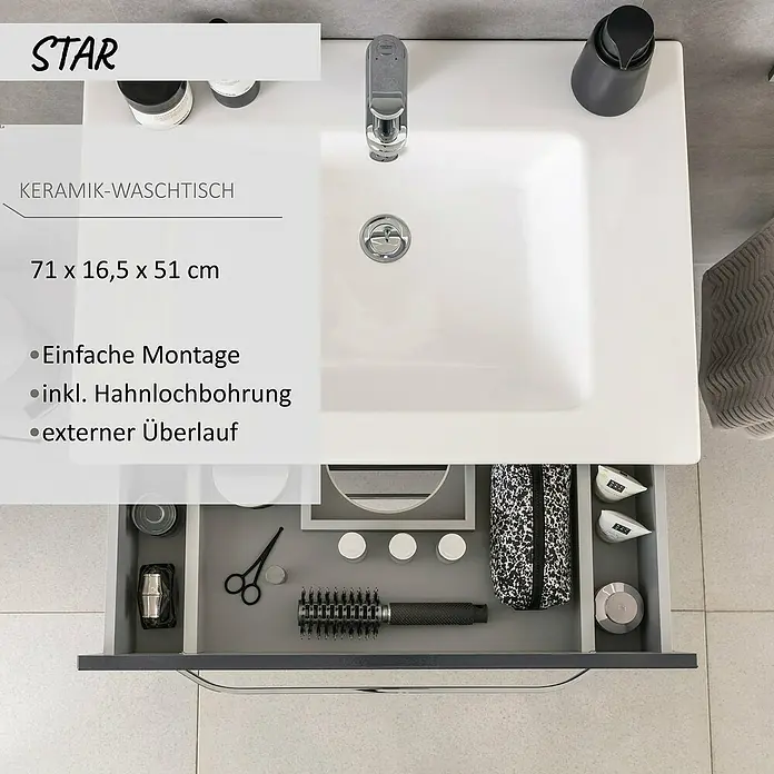 Camargue Star Einbauwaschbecken - 70 x 50 cm, Weiß - Weißes Keramik-Waschbecken mit modernem Wasserhahn und geöffneter grauer Schublade mit Toilettenartikeln darunter.