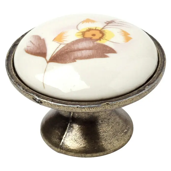 Rei Möbelknopf - Durchmesser: 29 mm, Porzellan, Antikes Messing - Bronze-farbener Metallknopf mit weißer Keramikoberseite und braun-gelbem Blumenmuster.