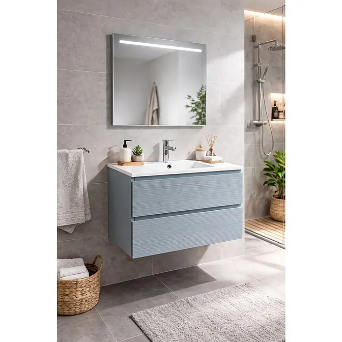 Conjunto de mueble de baño Cristal - Azul, 3 pzs. - Mueble de baño azul claro de pared con lavabo blanco y dos cajones texturizados, en un baño moderno.