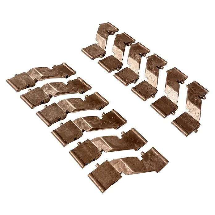 Dioco Smartwall Set de separadores para vallas Persiana - Plástico, Específico para: Vallas Persiana Smartwall, 10 pzs., Óxido - Eslabones de cadena metálicos, probablemente para orugas de maquinaria pesada, dispuestos en filas. Tienen un acabado desgastado marrón plateado.
