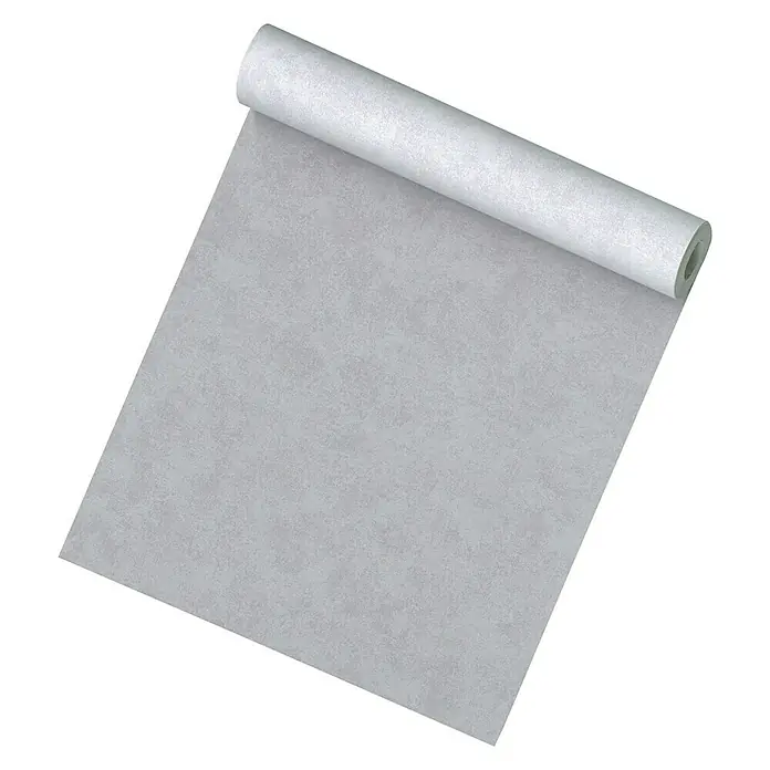 A.S. Création Vliestapete Innova - Hellgrau, Uni, 10,05 x 0,53 m - Ein Rollen-Backpapier, ideal für die Zubereitung von Kuchen und Gebäck, wird auf einer schwarzen Oberfläche präsentiert und in Szene gesetzt.