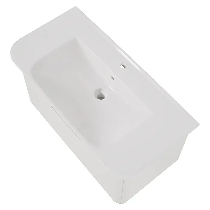 VitrA Sento Badmöbel-Set Sento - 98 cm, Weiß, Griffmulde - Weißes rechteckiges Keramikwaschbecken mit Hahnloch und Abfluss, aus erhöhter Perspektive.
