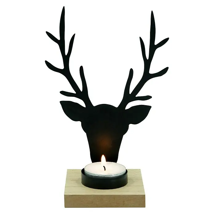Teelichthalter Hirsch - 7 x 7 x 17 cm, Holz, Schwarz/Natur - Schwarzer Metall-Kerzenhalter in Hirschkopf-Silhouette mit Geweih, auf hellem Holzsockel, mit brennendem Teelicht.
