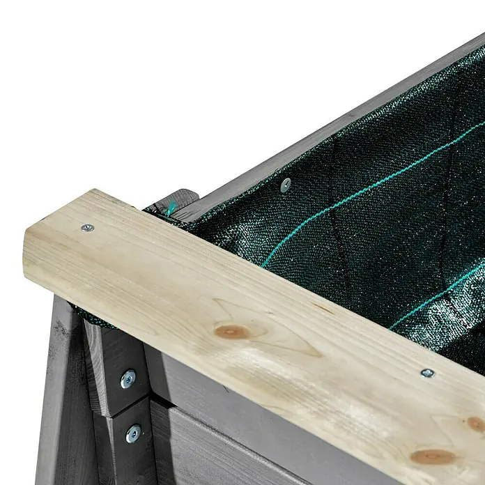 Exit Aksent Hochbeet - 94 x 146 x 50 cm, Holz, Grau - Ecke eines Hochbeets mit hellem Holzrand, dunkelgrauem Unterbau und dunkelgrünem Vlies, mit Schrauben befestigt.